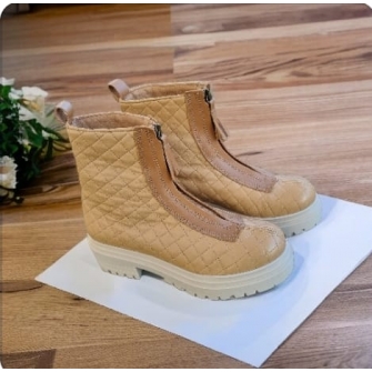 Bota tejido acolchado...